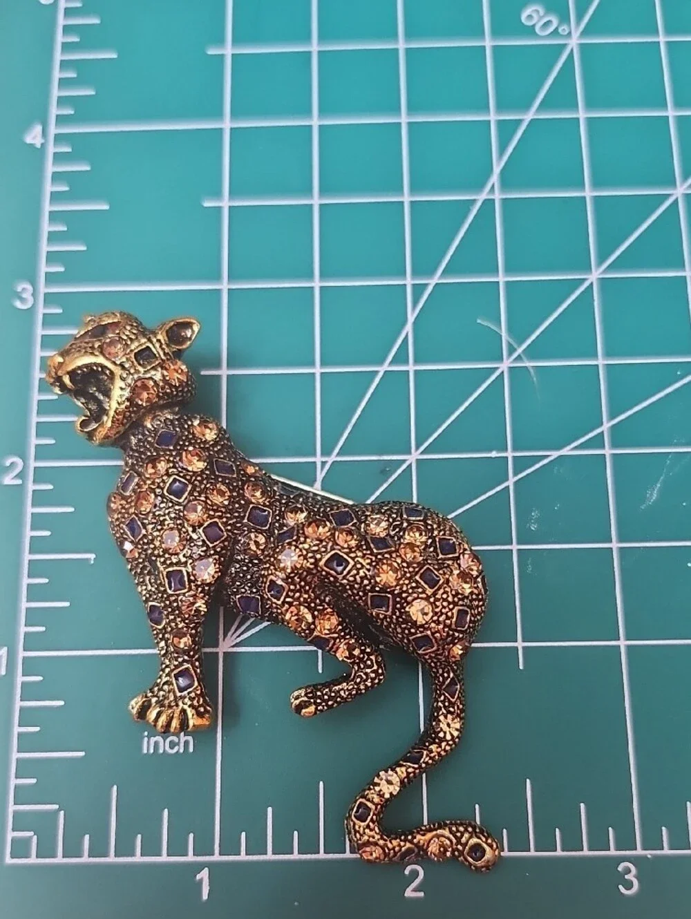 Gold-Tone Leopard Brooch with Blue and Pink Accents